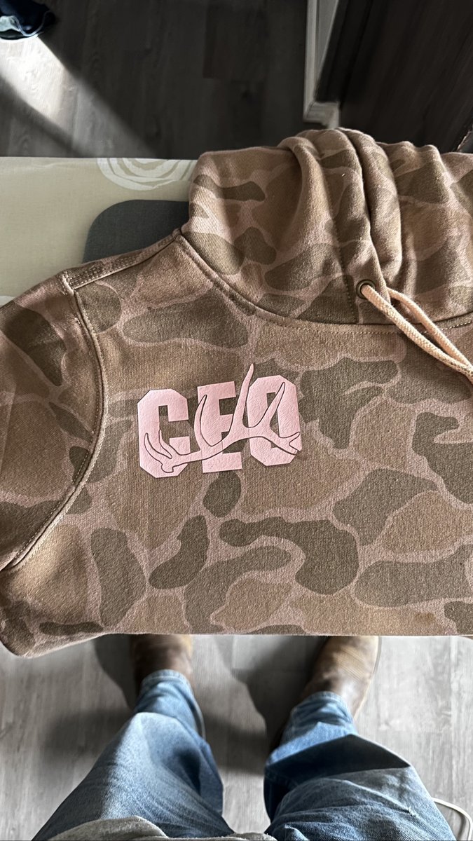 Camo hoodie with a pink CEO antler logo on the chest for Canyon Edge Outfitting, by KB Custom Creations