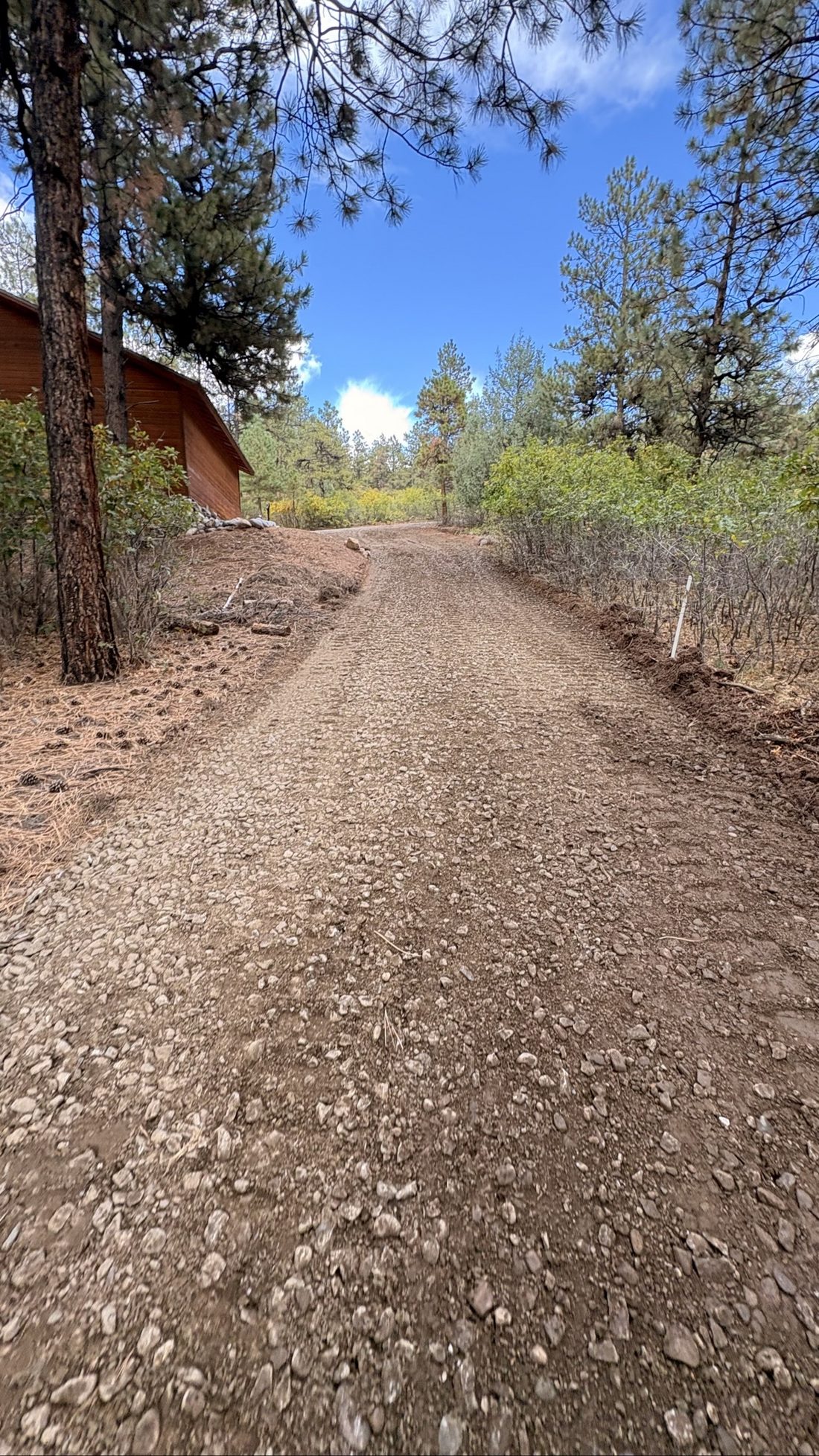 Reshaped and graded driveway after BK Hauling & Clearing work
