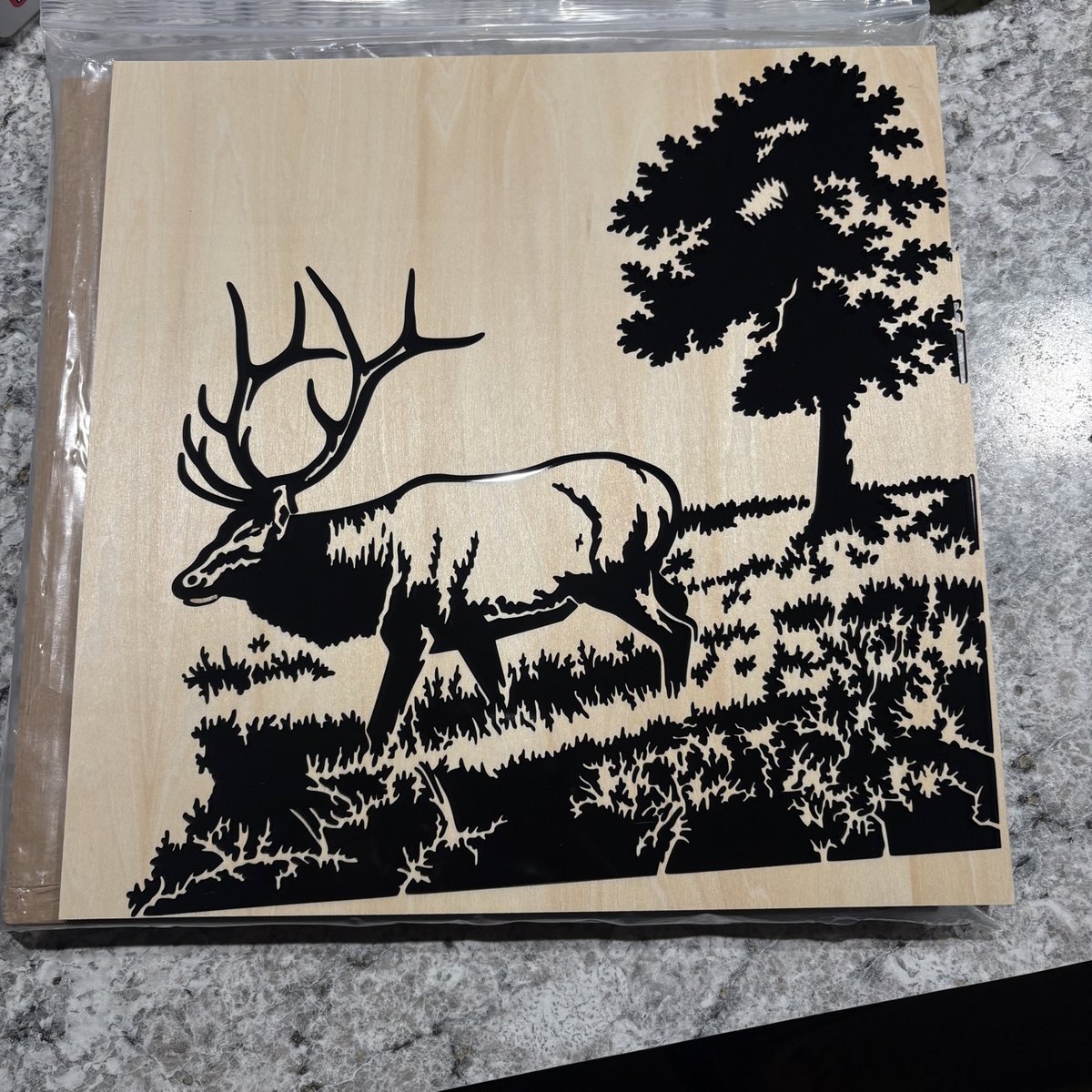 Wood wall art panel with a black elk and tree silhouette scene, by KB Custom Creations