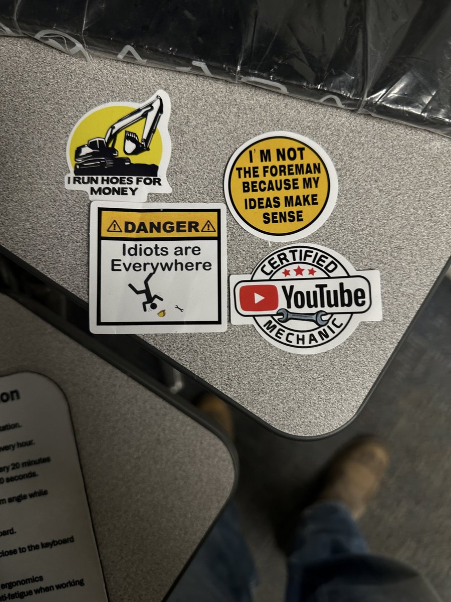 Novelty hard-hat stickers with job-site jokes, made by KB Custom Creations