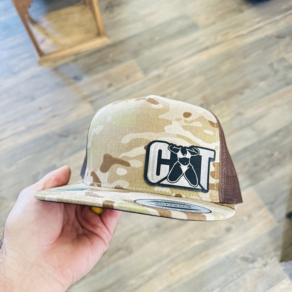 Desert camo trucker hat with a novelty patch, made by KB Custom Creations