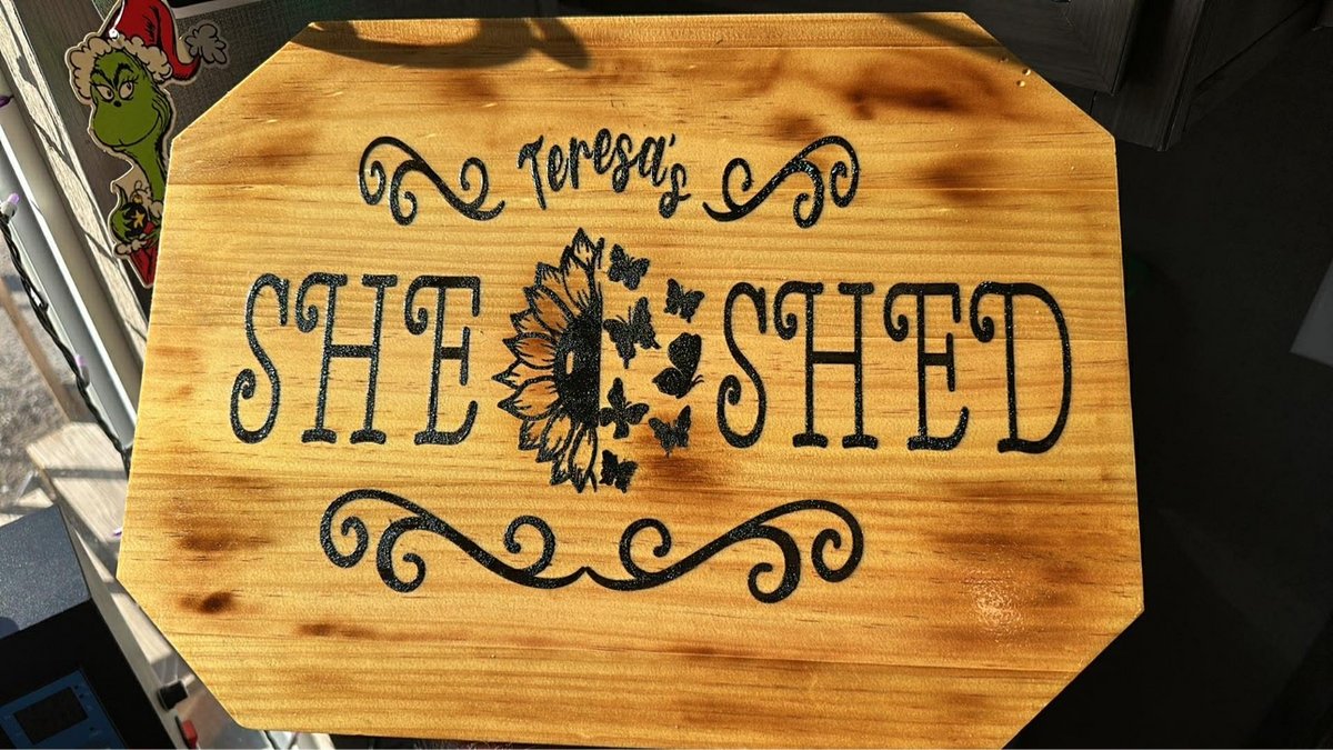 Torched wood She Shed sign with a sunflower and butterflies, personalized with a name, by KB Custom Creations