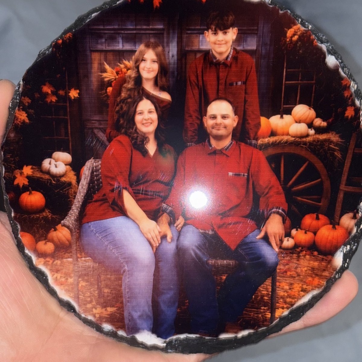Round slate with a family portrait printed on it, by KB Custom Creations